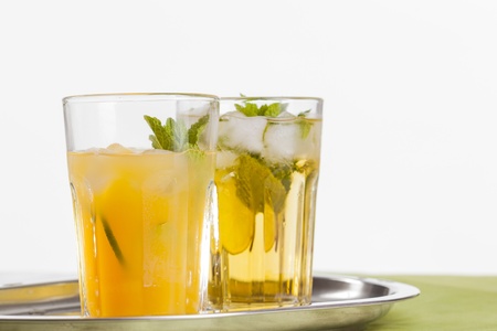 refreshing cool summer drinks home made lemonade and orange juiceの写真素材