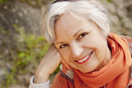 best ager women smiling outdoors