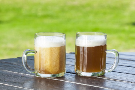 refreshing chilled german beer in summer gardenの写真素材