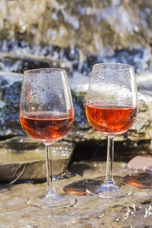 delicious fresh ros wine chilled in waterfallの写真素材