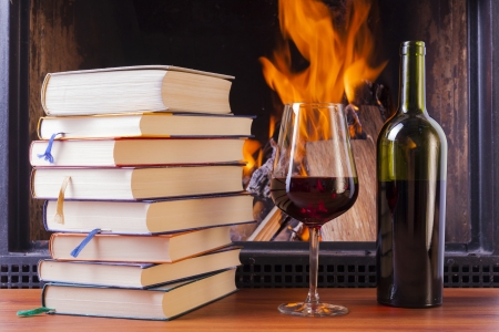 relaxing drinks at cozy warm fireplace in winterの写真素材