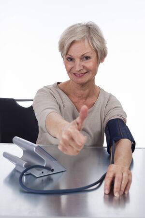 confident neat senior woman various situations at homeの写真素材