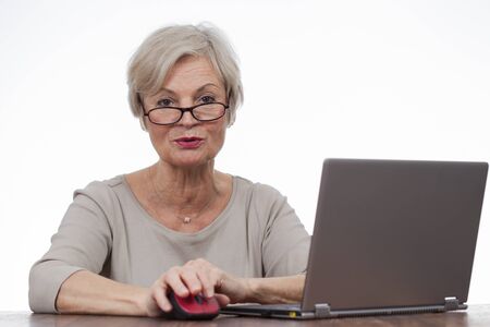 confident neat senior woman various situations at homeの写真素材