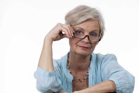 confident neat senior woman various situations at homeの写真素材