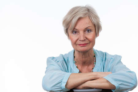 confident neat senior woman various situations at homeの写真素材