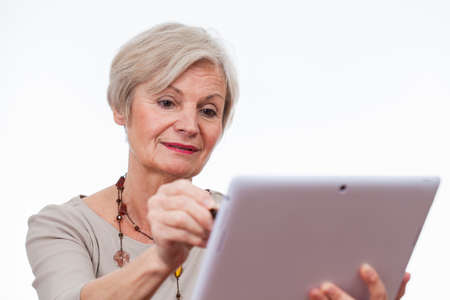 confident neat senior woman various situations at home