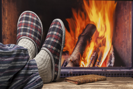 fireplace relax winter fall autumn  rustic dark wooden floor dark pyjamaの写真素材