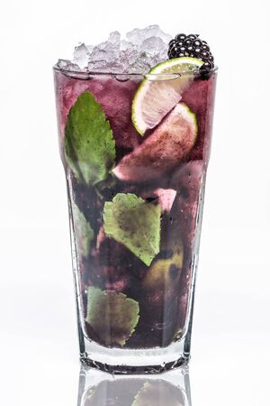A glass of Mojito Blackberry cocktailの写真素材