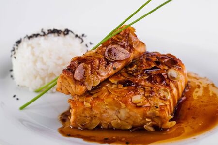 A plate of rice with fishの写真素材