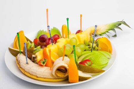 A plate of fresh fruitの写真素材