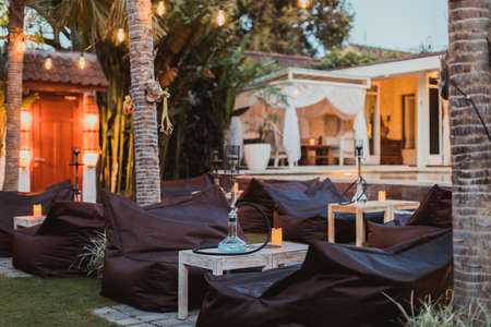 Shisha bar with a sitting bag. Lounge place. hookah in interior. summer time.