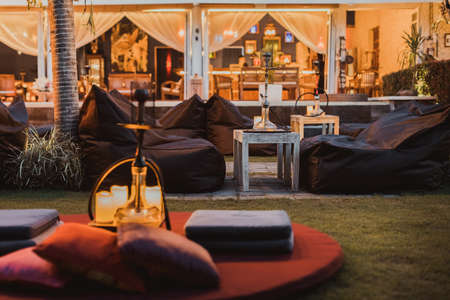 Shisha bar with a sitting bag. Lounge place. hookah in interior. summer time.の写真素材