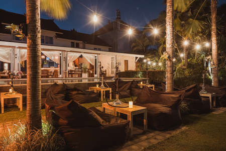 Shisha bar with a sitting bag. Lounge place. hookah in interior. summer time.の写真素材