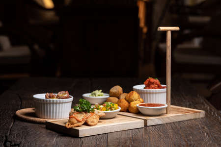 Spanish food, tapas, appetizers with seafood, meet and sauces. Vegan vegetarianの写真素材