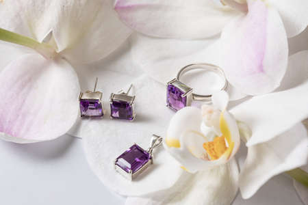 Jewelry set which includes necklace, presented purple amethyst on gold pendantの写真素材