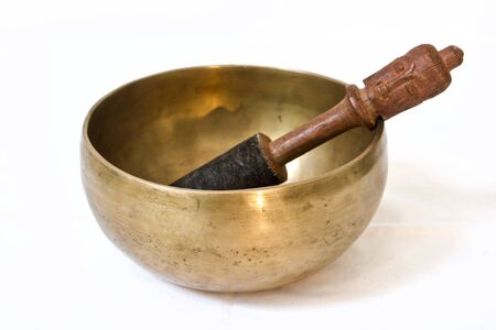 Tibetan singing bowl on white backgroundの写真素材