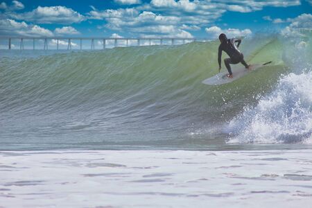 Surfing Rincon point in Californiaの写真素材