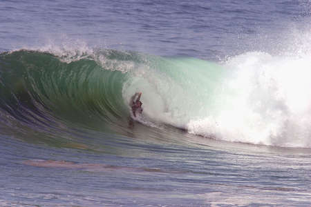 Malibu, California / USA - 05-11-2004: Big south swell at Supertubes surfing spot.