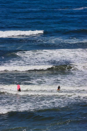 Surfing, hiking and sunbathing at Sand Dollar State Beach in Big Sur Californiaの写真素材
