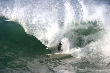Malibu, California / USA - 05-11-2004: Big south swell at Supertubes surfing spot.のeditorial素材
