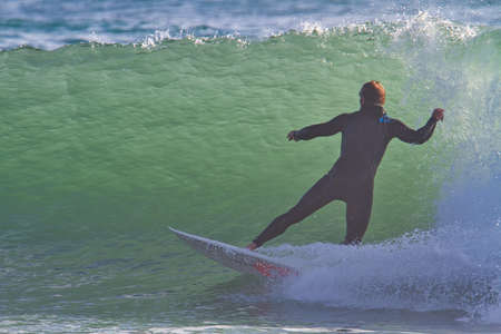 Surfing at Rincon point  in Californiaの写真素材