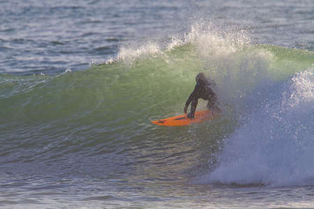 Surfing Rincon point in Californiaの写真素材
