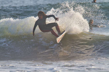 Surfing in Rincon Californiaの写真素材