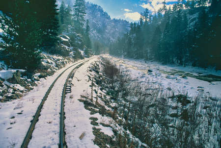 Vintage train trip in snowy Colorado mountainsの写真素材