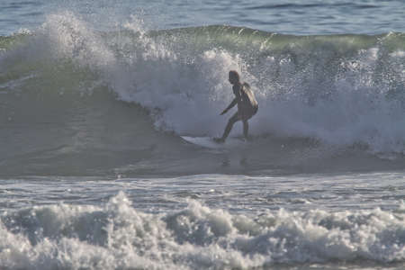 Surfing Rincon point in Californiaの写真素材