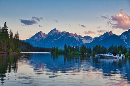 Summer sunset on a lake in Grand Teton national parkの写真素材