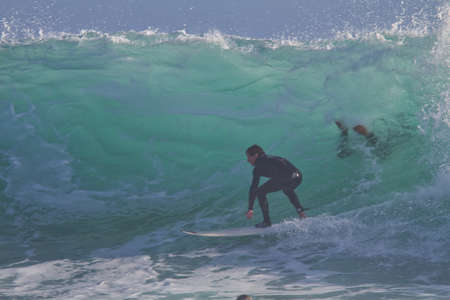 Surfing in Rincon point in California