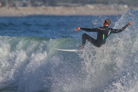 Surfing in Rincon in Californiaの写真素材