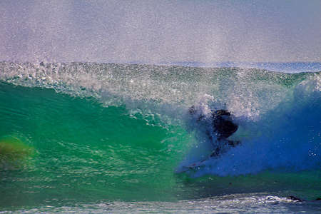 Surfing in the Rincon Classic surfing contest in 2009