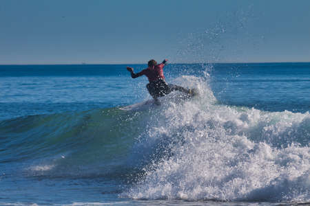 Surfing in the Rincon Classic surfing contest in Californiaの写真素材