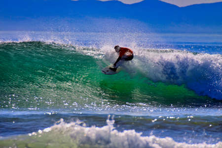 Surfing in the Rincon Classic surfing contest in Californiaの写真素材