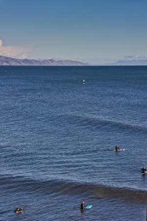 Surfing at sunset on the Santa Barbara Mesaの写真素材