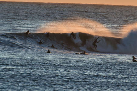 Surfing big waves in Santa Barbara Harbor