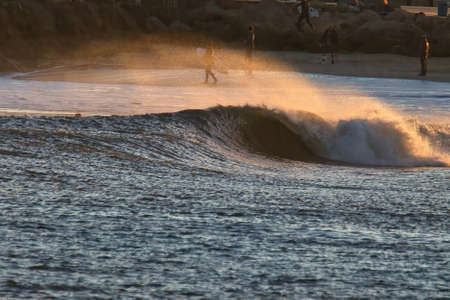 Surfing big waves in Santa Barbara Harbor