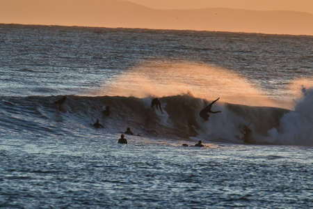 Surfing big waves in Santa Barbara Harbor