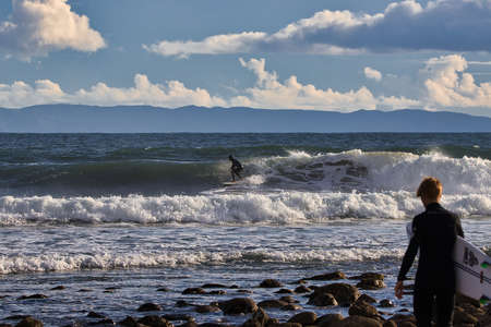 Winter storm waves and clouds at Rincon point in Californiaの写真素材