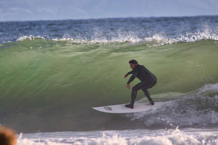 Surfing winter waves at Rincon point in California