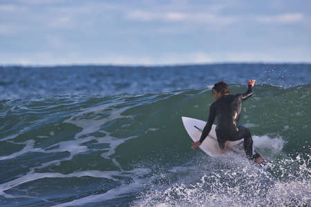 Surfing winter waves at Rincon point in Californiaの写真素材