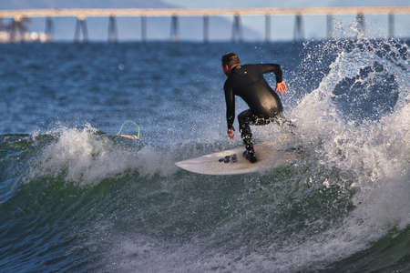 Surfing winter waves at Rincon point in California