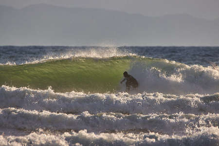 Surfing Rincon point in California