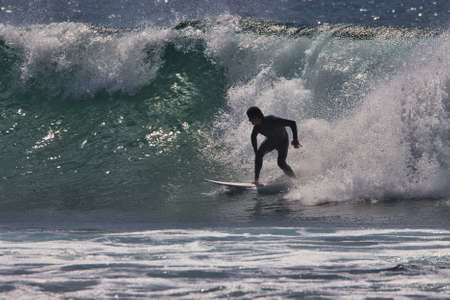 surfing summer waves in Malibu