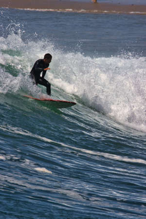 Surfing summer waves at Malibu California