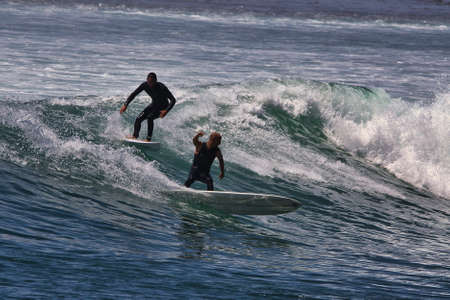 Surfing summer waves at Malibu Californiaのeditorial素材