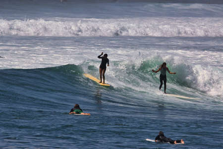 Surfing summer waves in Malibu California