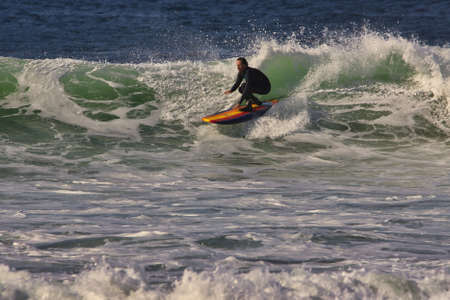 Surfing summer waves at Leo Carrillo state beach