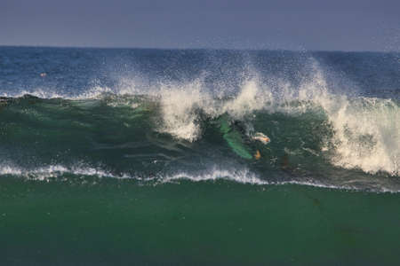 Surfing summer waves at Leo Carrillo state beach